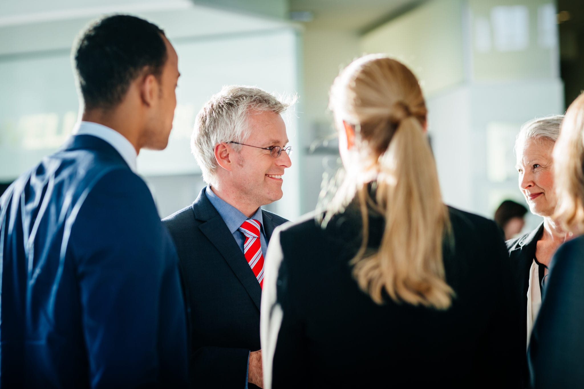 Business owner addresses colleagues