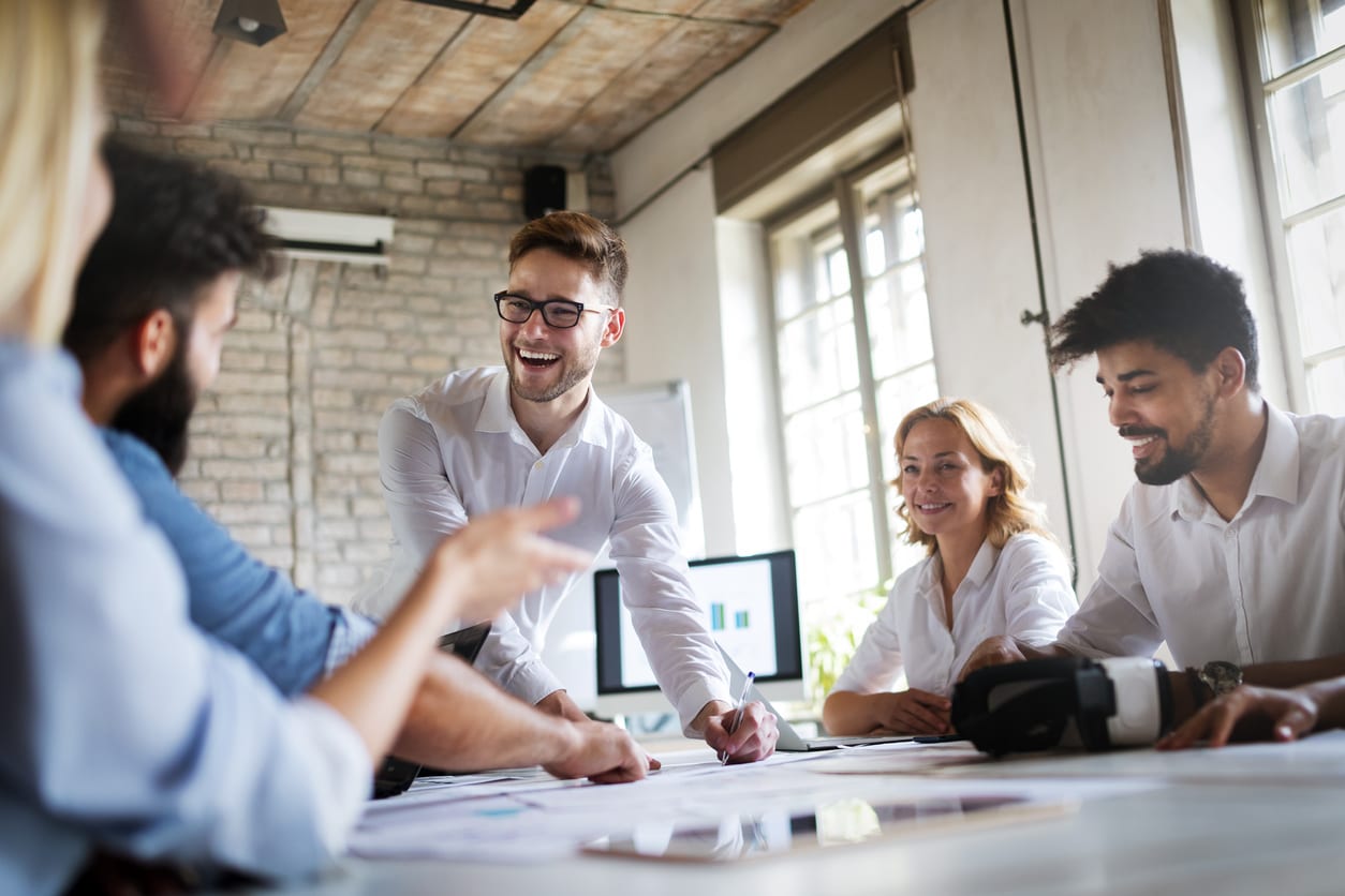 Businessman laughing in meeting