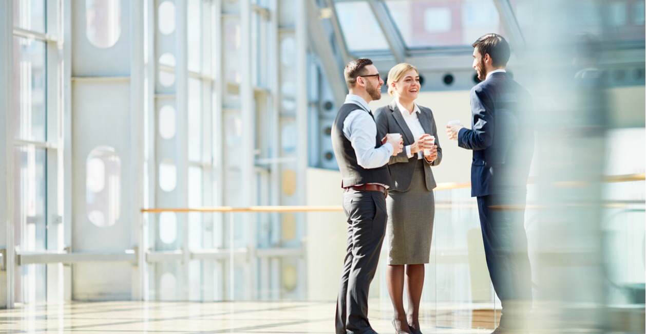 Business Colleagues Speaking With Their Manager