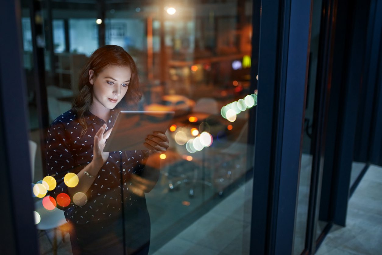 businesswoman looking at her tablet