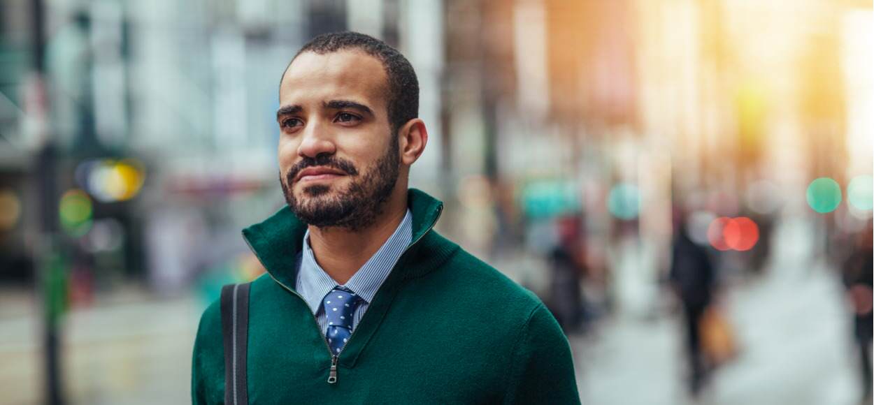 Portrait of man in street