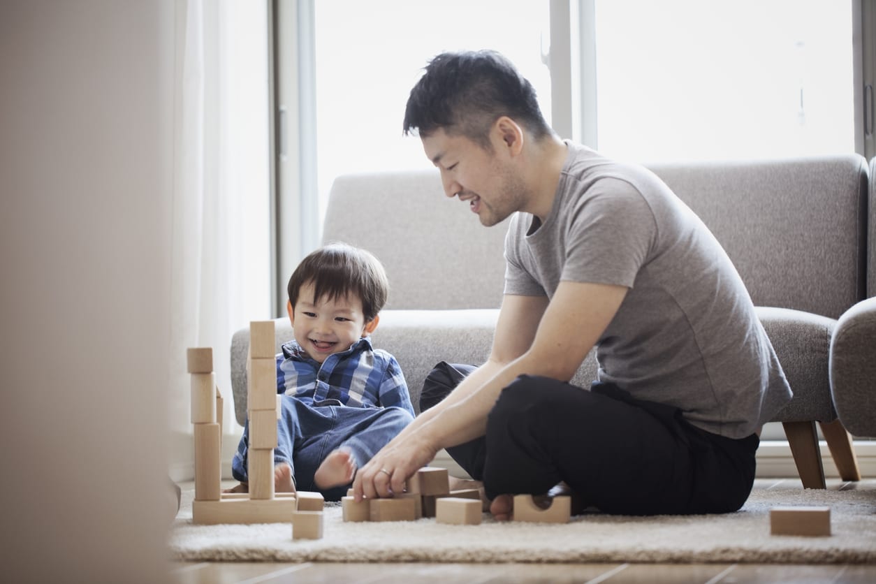 father playing with son