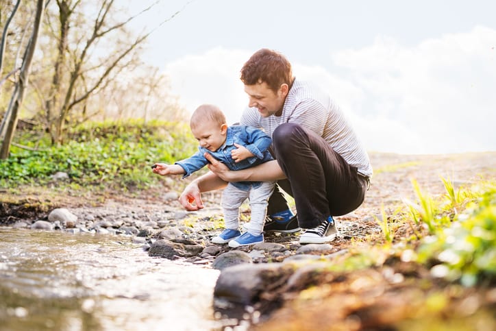 father playing with his son