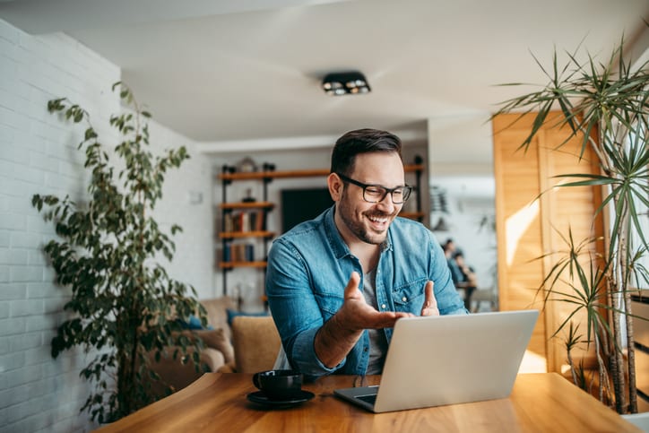 cheerful man on video call