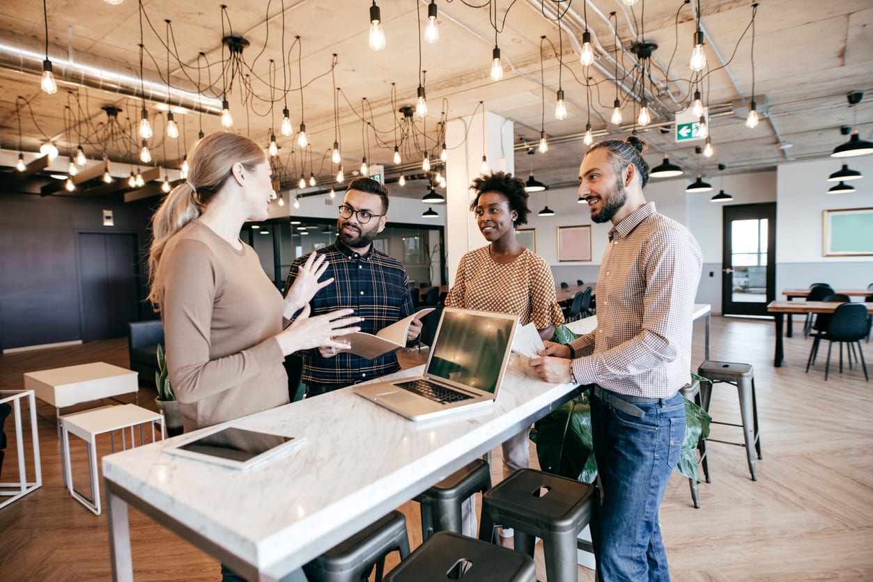 colleagues in a stand-up team meeting