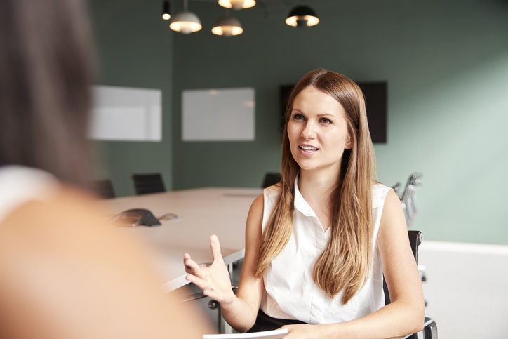 businesswoman conducting interview