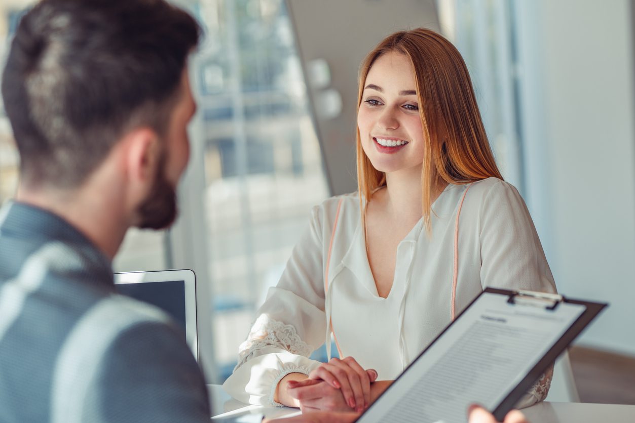 student speaking to her manager