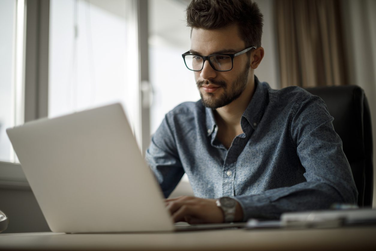 student on his laptop