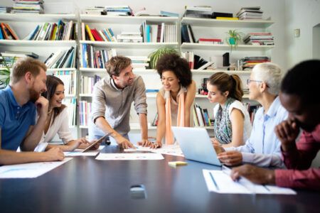 Successful group of business people at work in modern office