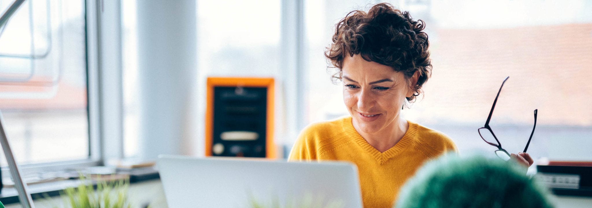 Photo of mature business woman is happy with today's business