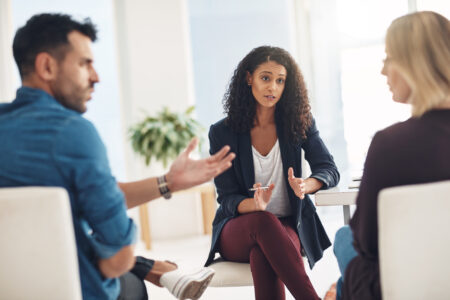 Shot of a couple having an argument during a counseling session with a therapist