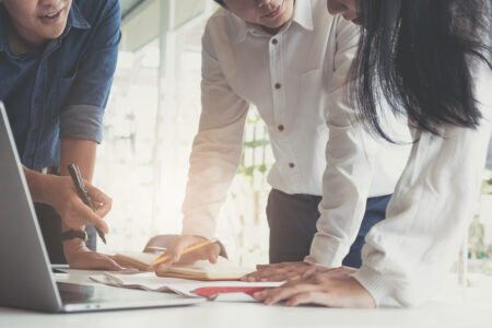 Business financial, accountant discussing with partner are meeting to audit finance planning sales to meet targets set in next year. stock market concept.