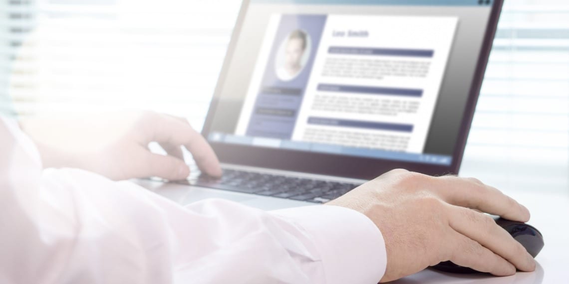 image of guy working on laptop