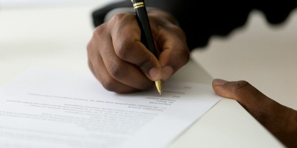 image of signing documentation