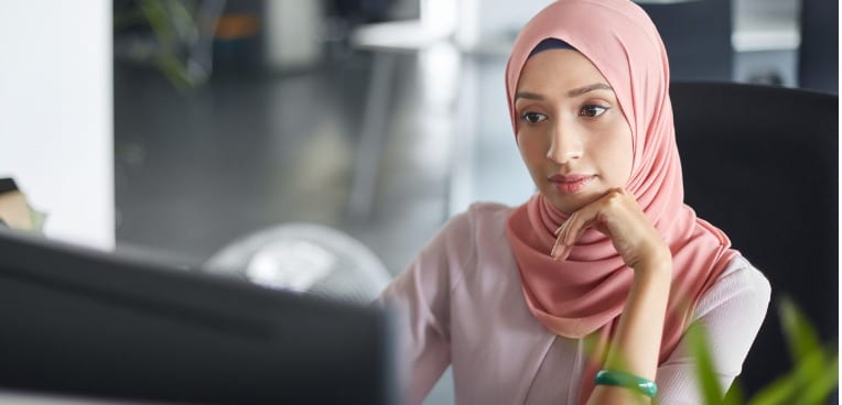 image of woman working at desk