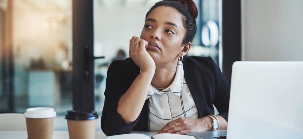 Women staring off into the distance whilst at work