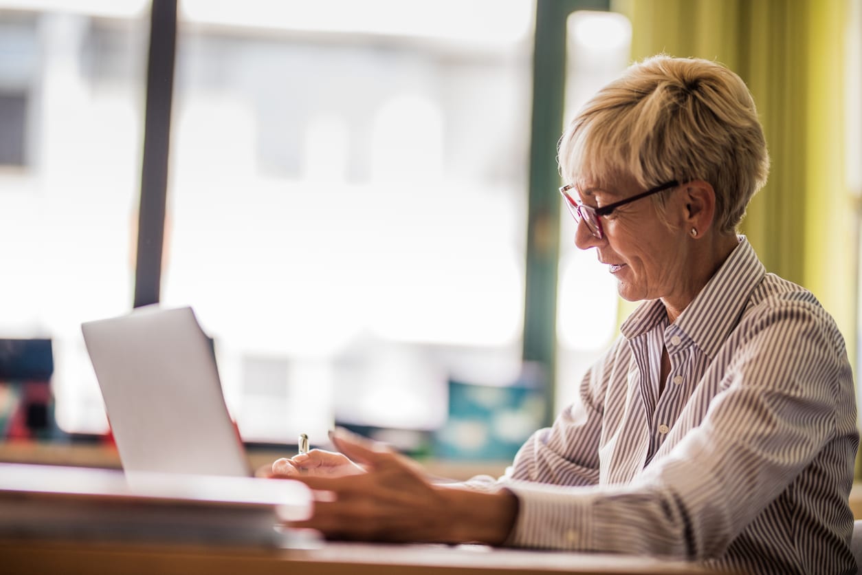 woman looking at laptop