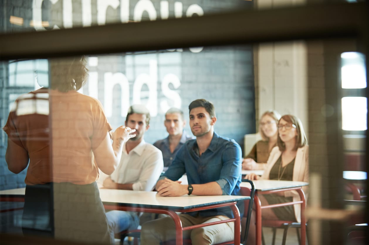 colleagues listening to ceo