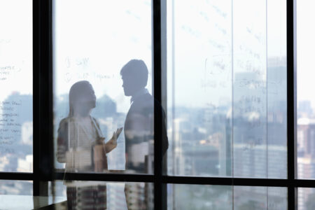 Silhouette shadows of business people talking in office