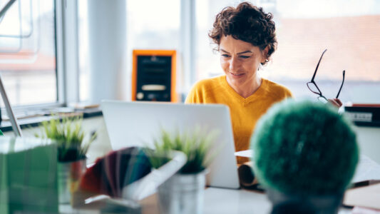 Photo of mature business woman is happy with today's business