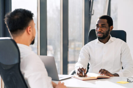 The head of the company conducts interview for the future employee