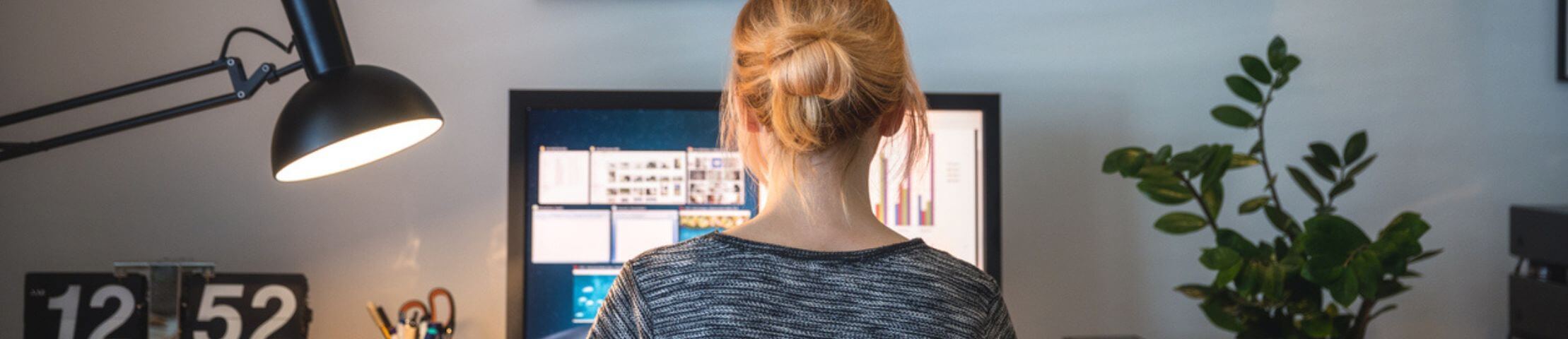 Women looking at a computer in an office