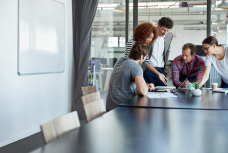 Shot of office workers in a meeting in a boardroom