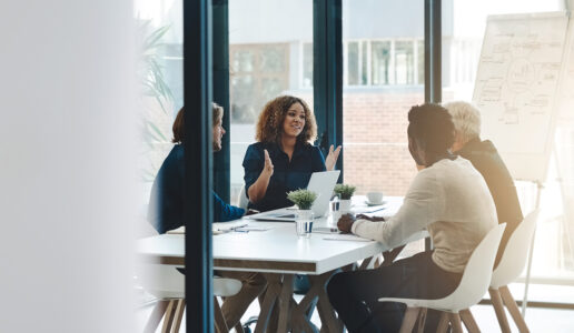 Cropped shot of a group of businesspeople having a boardroom meeting in an office